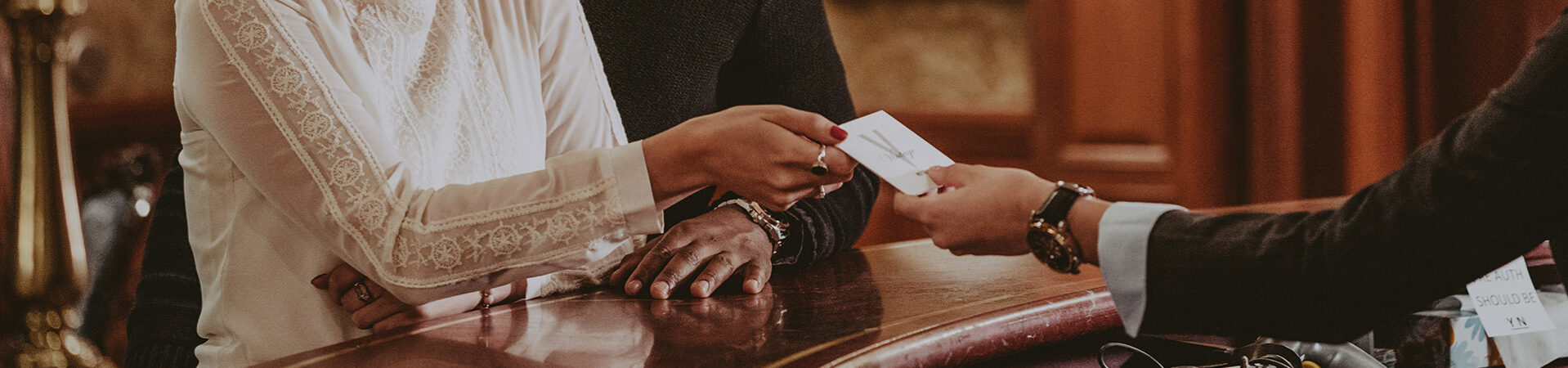 Guests receiving a Vintage Hotels room key