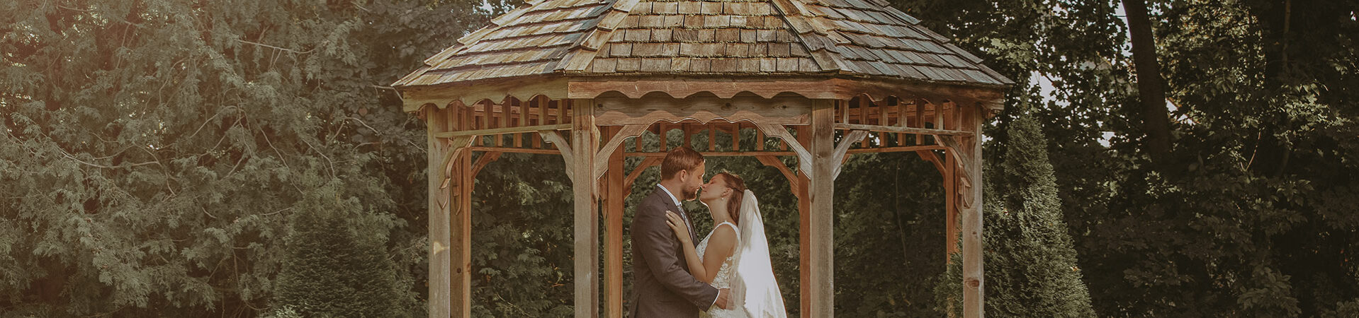 Couple share intimate moment on their wedding day at Millcroft Inn & Spa in Caledon