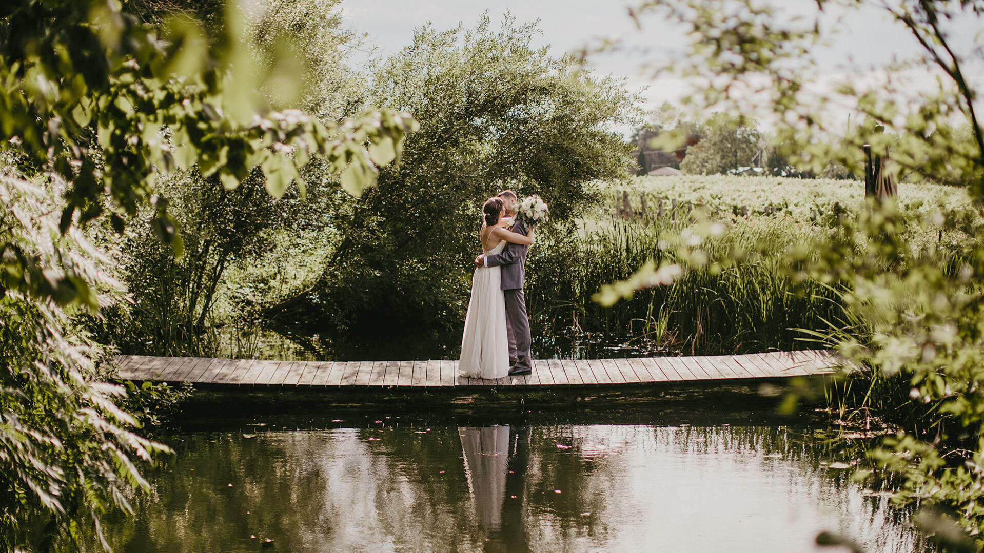 Couple share a romantic moment on wedding day at Inn On The Twenty in Jordan Village