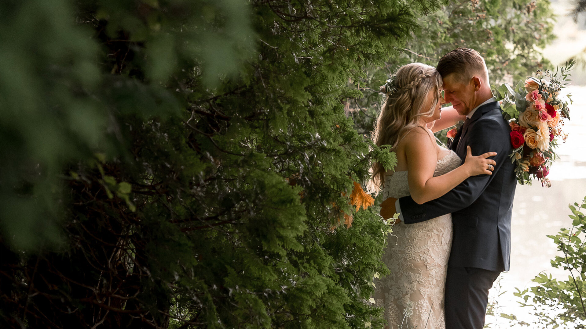 Couple sneaking a moment for themselves on their wedding at Millcroft Inn & Spa in Caledon