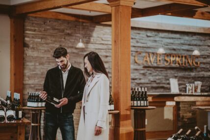 A couple visiting Cave Spring Vineyard in the Niagara Benchlands.