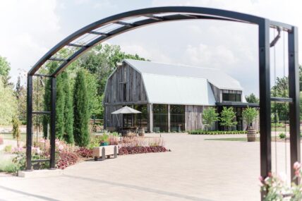 Large outdoor space and barn event facility in The Gardens at Pillar and Post in Niagara-on-the-Lake, Ontario.