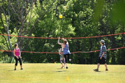 A team playing volleyball at Millcroft Inn & Spa in Caledon, Ontario.