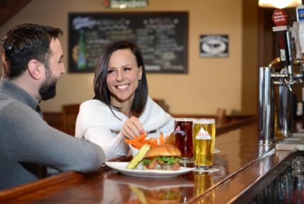 A couple dining at Jordan House Tavern in the Niagara Benchlands.