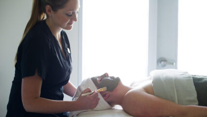 A woman receiving a facial at Millcroft Spa in Caledon, Ontario.