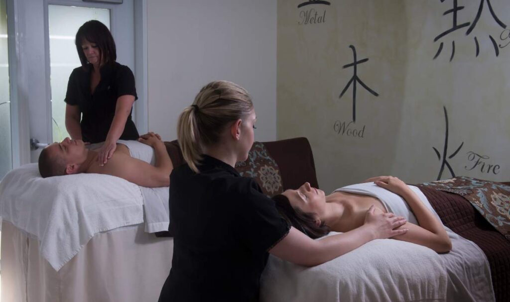 A couple enjoying a couples' spa treatment during a Valentine's Day getaway in Niagara