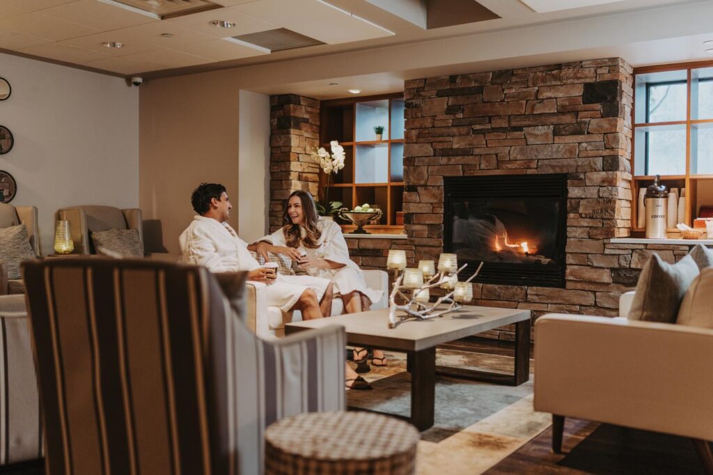 A couple relaxing in the spa lounge after the Yon-Ka Vitamin C25 Facial.