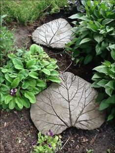 Leaf shaped stepping stones in a garden near Vintage Hotels.