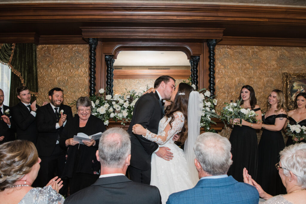 Bride and groom first kiss at Prince of Wales