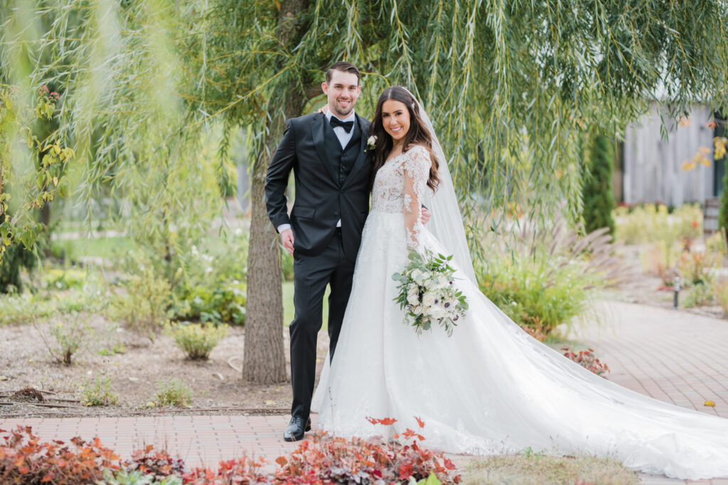 Bride and groom in The Gardens at Pillar and Post