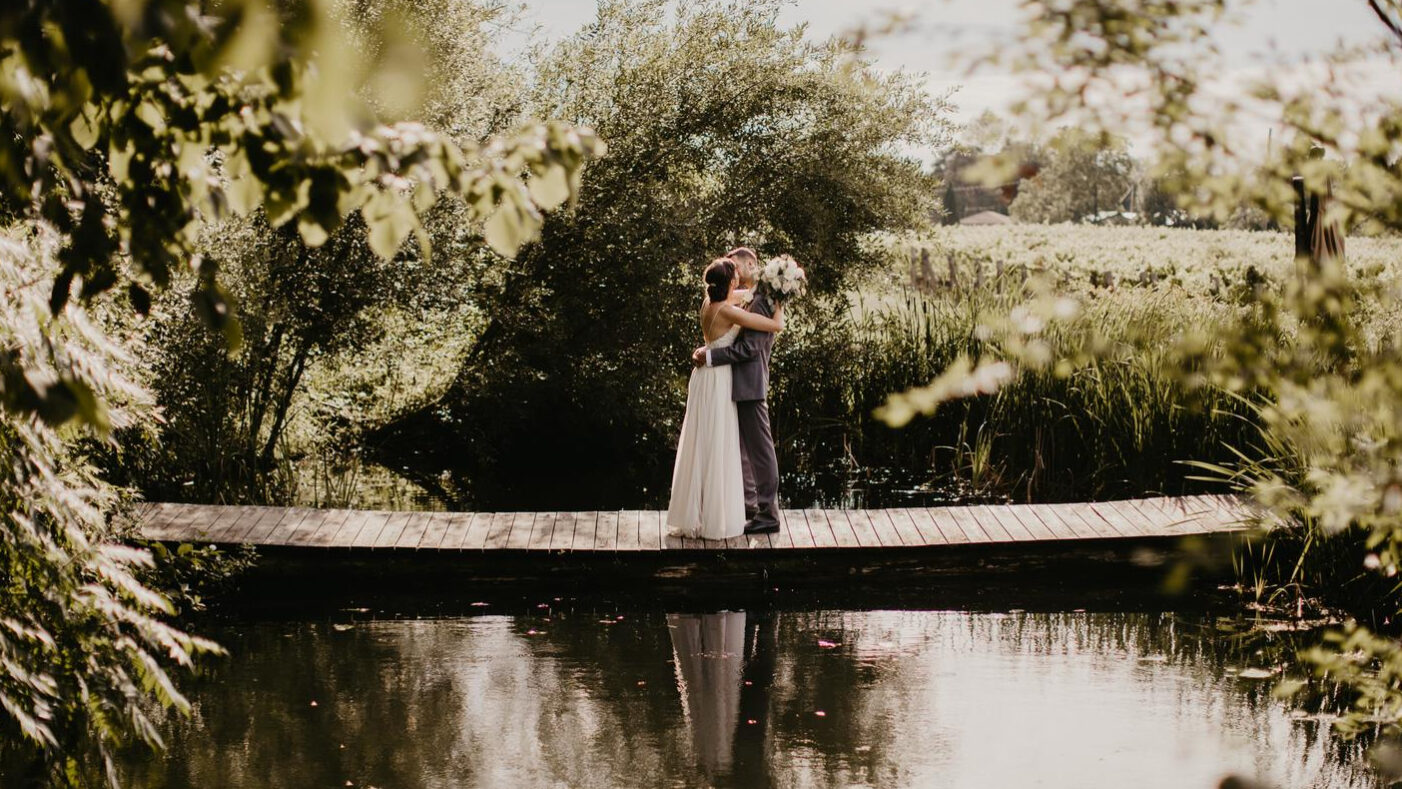 A couple of newlyweds at Cave Spring Vineyards.