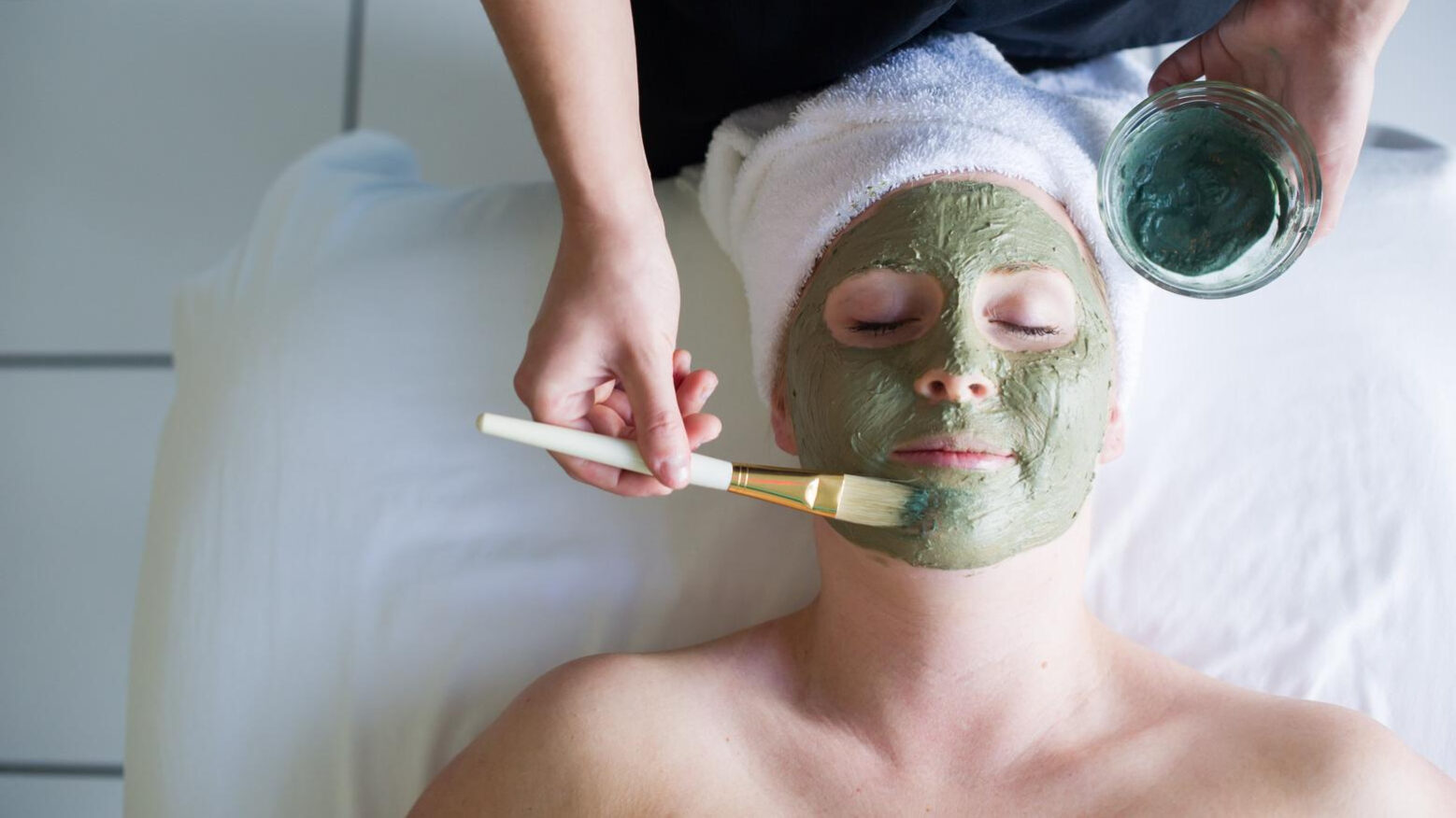 A woman receiving a springtime facial at Vintage Hotels.