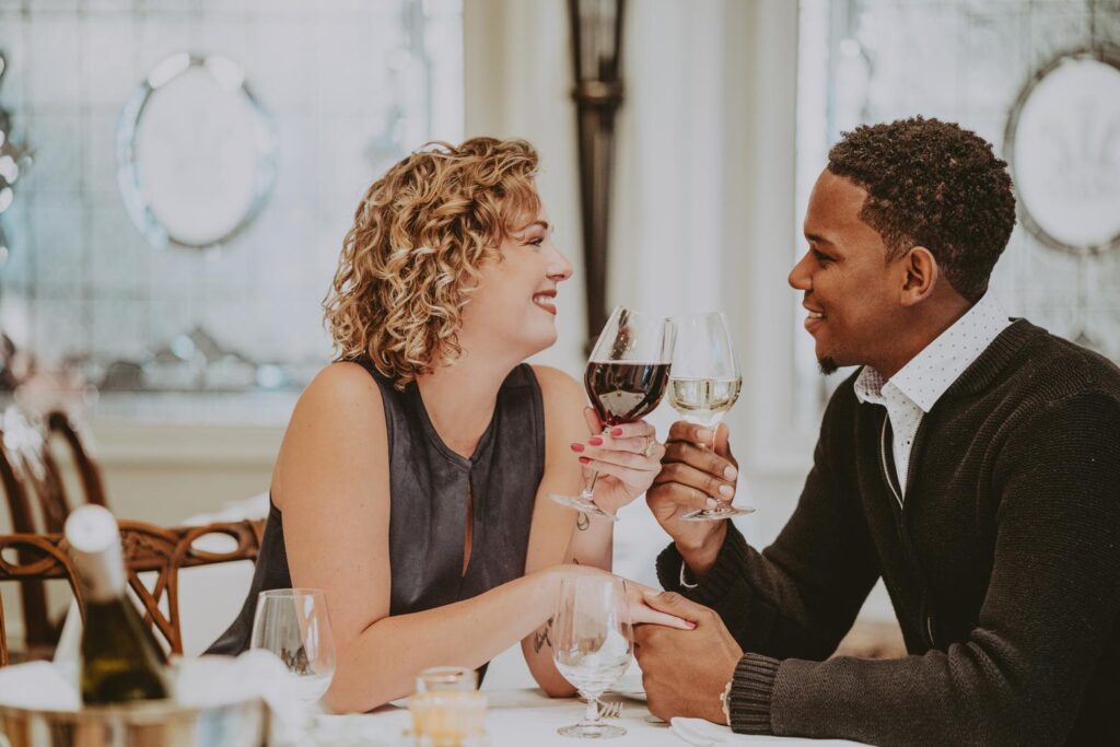 A couple tasting Niagara wines at the Noble Restaurant in Niagara-on-the-Lake.