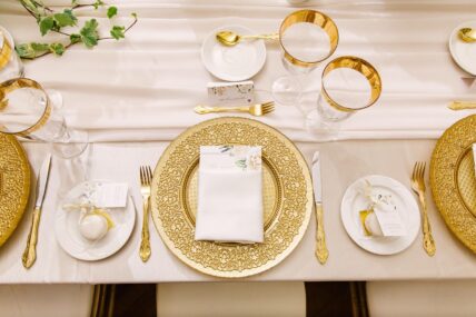 Guest dining at a Southeast Asian wedding in the Queen’s Landing hotel.